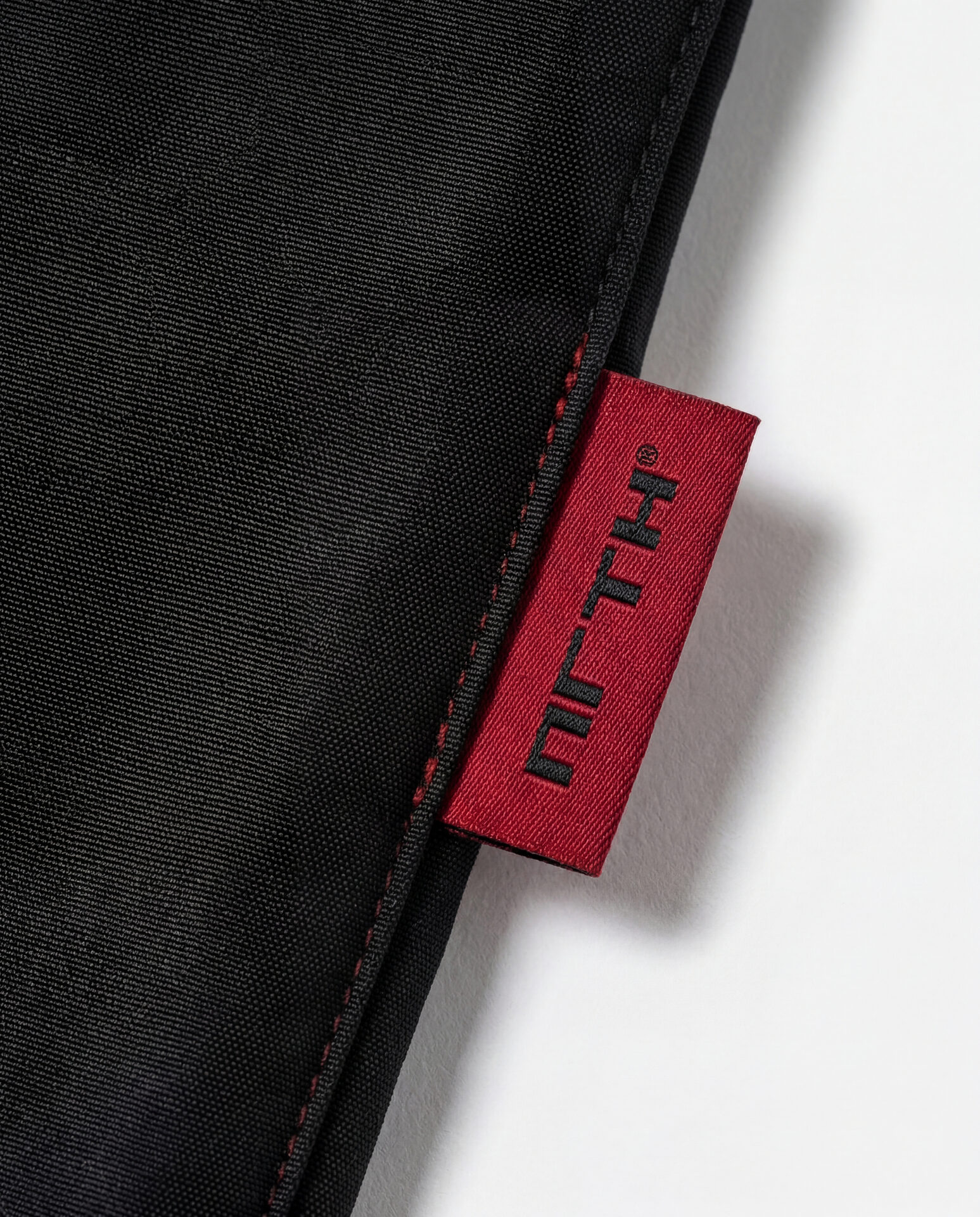 Red woven label